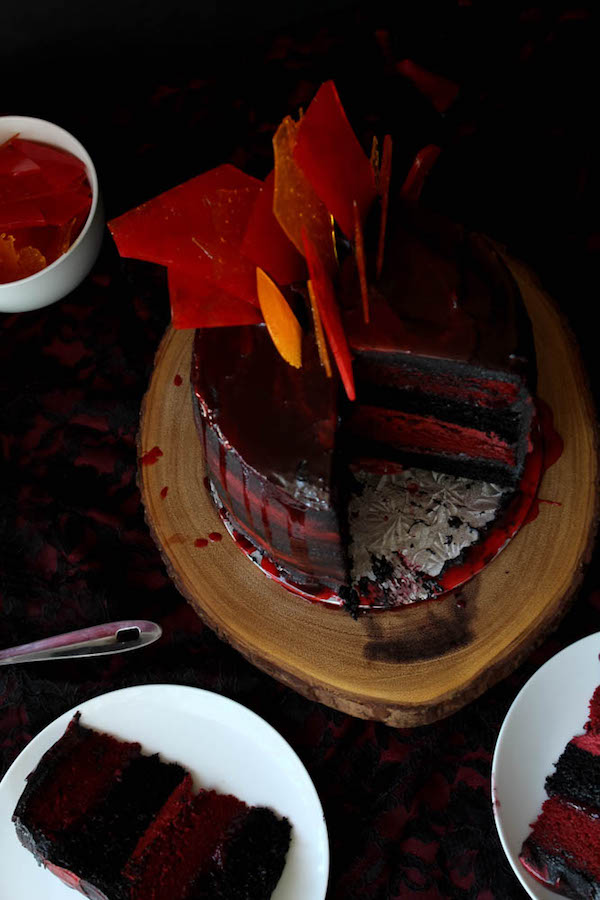 Fire and Blood Dragon Cake with Red Velvet and Chocolate cake layers, strawberry-raspberry sauce filling, red velvet and black chocolate buttercream and candy fire shards!