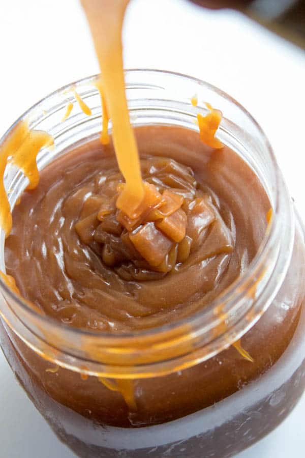 This classic Homemade Caramel Sauce is incredibly delicious and simple to make! Once you try this perfect caramel, you'll never go back to store-bought.