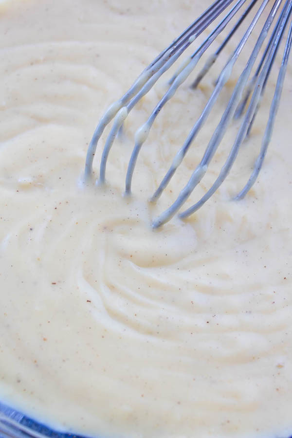 Smooth and silky Homemade Vanilla Pudding, this classic dessert is made completely from scratch and takes less than 15 minutes to make. With only a few simple ingredients, you can whip up your own irresistible, homemade vanilla pudding!