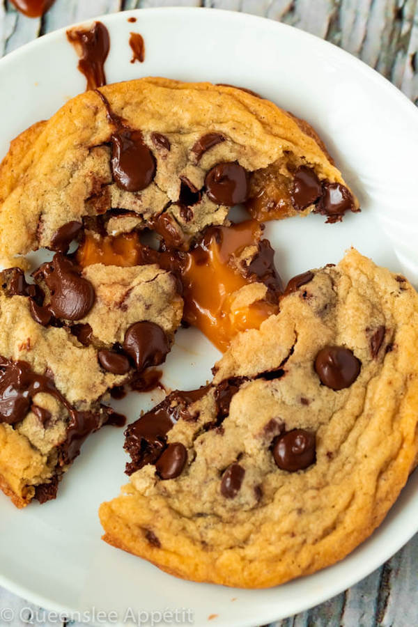 These Salted Caramel Chocolate Chip Cookies are perfectly soft and chewy and are stuffed with gooey caramel and garnished with sea salt! Classic Chocolate Chip Cookie + Salted Caramel = a match made in cookie heaven!