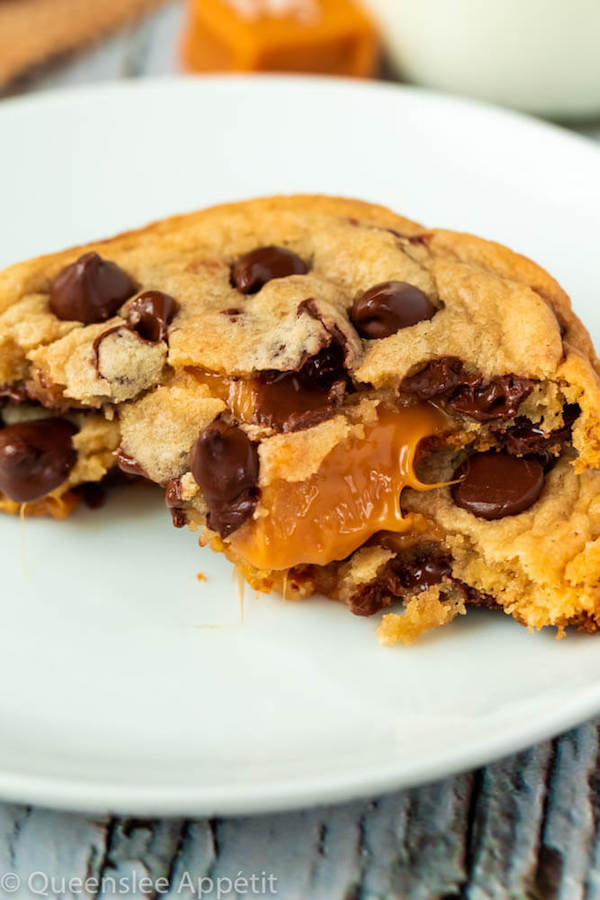 These Salted Caramel Chocolate Chip Cookies are perfectly soft and chewy and are stuffed with gooey caramel and garnished with sea salt! Classic Chocolate Chip Cookie + Salted Caramel = a match made in cookie heaven!