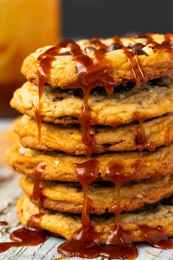 These Salted Caramel Chocolate Chip Cookies are perfectly soft and chewy and are stuffed with gooey caramel and garnished with sea salt! Classic Chocolate Chip Cookie + Salted Caramel = a match made in cookie heaven!