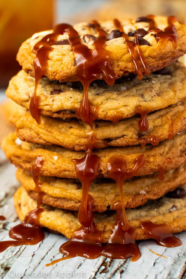 These Salted Caramel Chocolate Chip Cookies are perfectly soft and chewy and are stuffed with gooey caramel and garnished with sea salt! Classic Chocolate Chip Cookie + Salted Caramel = a match made in cookie heaven!