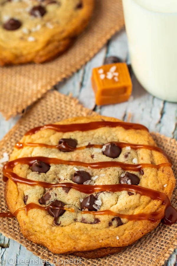 These Salted Caramel Chocolate Chip Cookies are perfectly soft and chewy and are stuffed with gooey caramel and garnished with sea salt! Classic Chocolate Chip Cookie + Salted Caramel = a match made in cookie heaven!