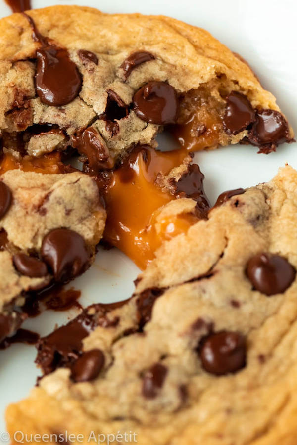 These Salted Caramel Chocolate Chip Cookies are perfectly soft and chewy and are stuffed with gooey caramel and garnished with sea salt! Classic Chocolate Chip Cookie + Salted Caramel = a match made in cookie heaven!