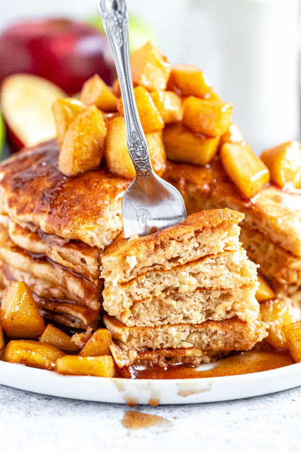 apple cinnamon pancakes topped with maple cinnamon apple topping