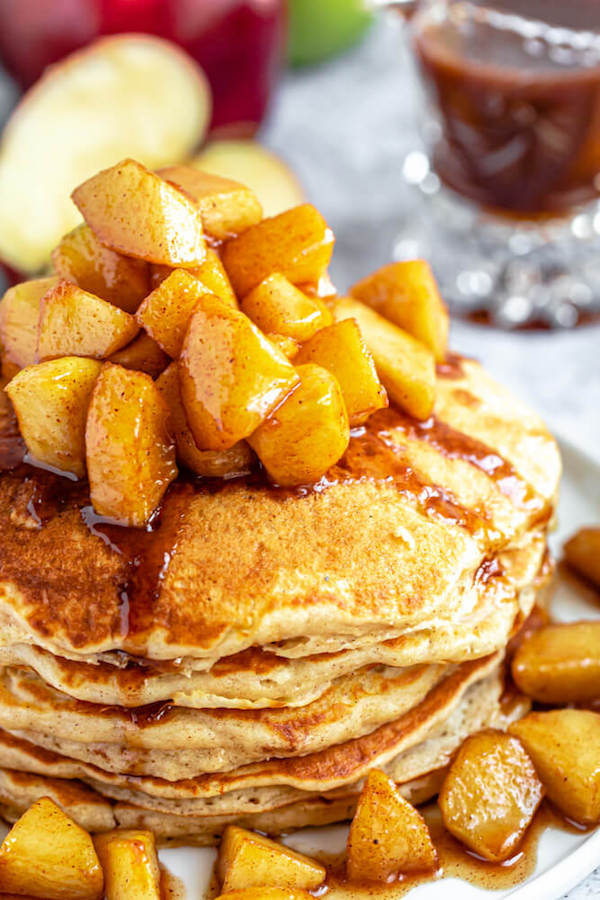 apple cinnamon pancakes topped with maple cinnamon apple topping