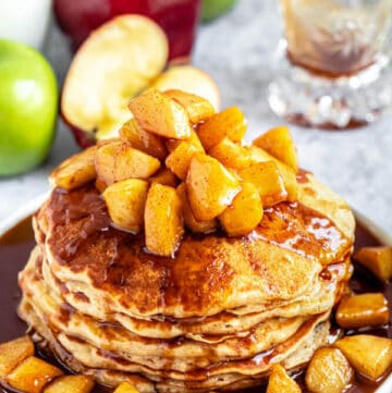 apple cinnamon pancakes topped with maple cinnamon apple topping