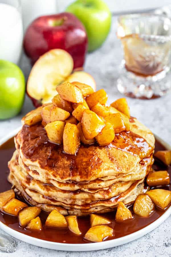 apple cinnamon pancakes topped with maple cinnamon apple topping