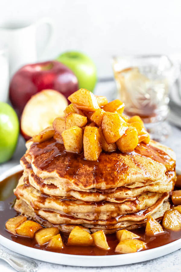 apple cinnamon pancakes topped with maple cinnamon apple topping