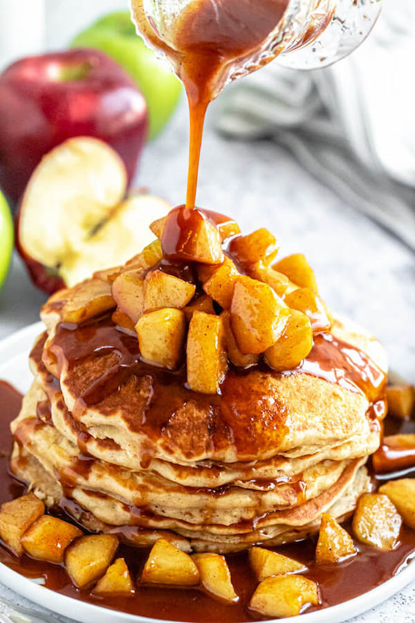 apple cinnamon pancakes topped with maple cinnamon apple topping