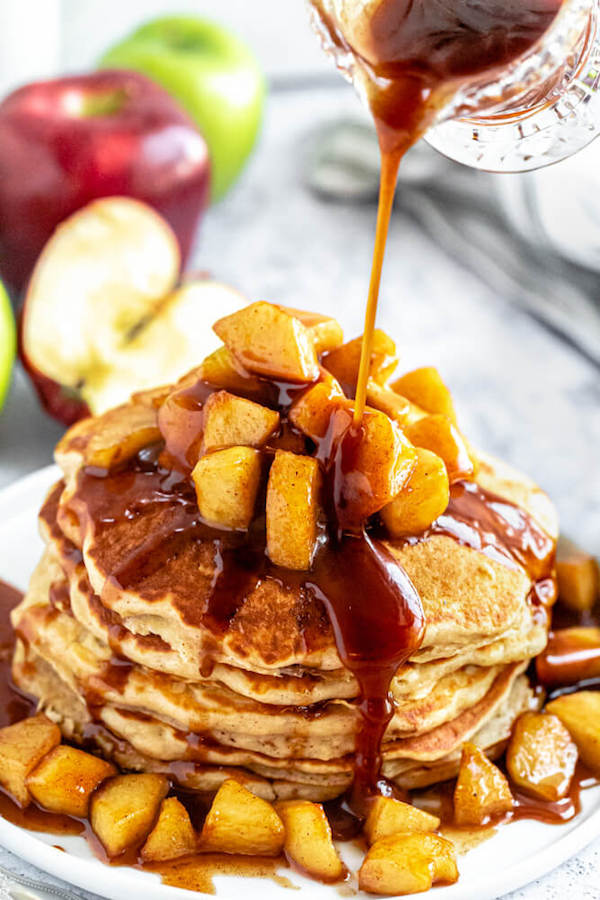 apple cinnamon pancakes topped with maple cinnamon apple topping