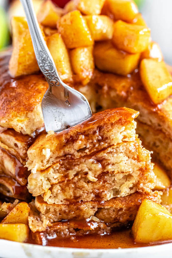 apple cinnamon pancakes topped with maple cinnamon apple topping