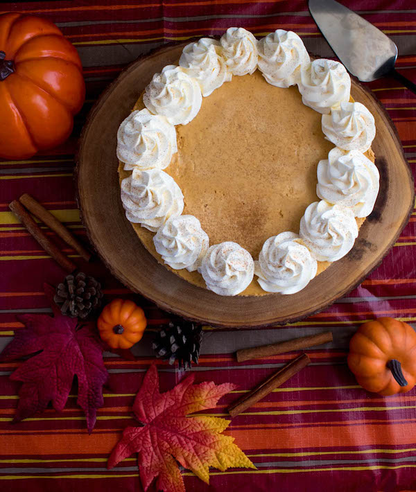 Rich and creamy pumpkin cheesecake paired with a spiced gingersnap crust! This is the perfect dessert to enjoy after your Thanksgiving dinner. 