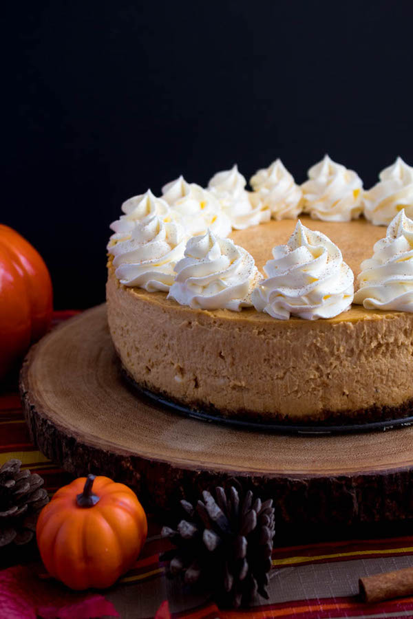 Rich and creamy pumpkin cheesecake paired with a spiced gingersnap crust! This is the perfect dessert to enjoy after your Thanksgiving dinner. 