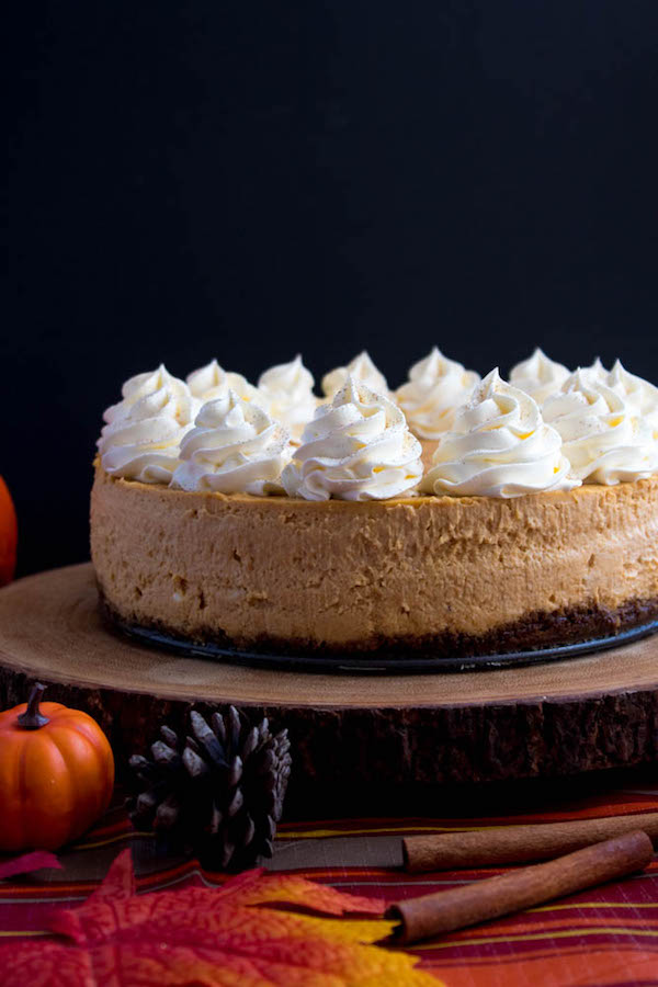 Rich and creamy pumpkin cheesecake paired with a spiced gingersnap crust! This is the perfect dessert to enjoy after your Thanksgiving dinner. 