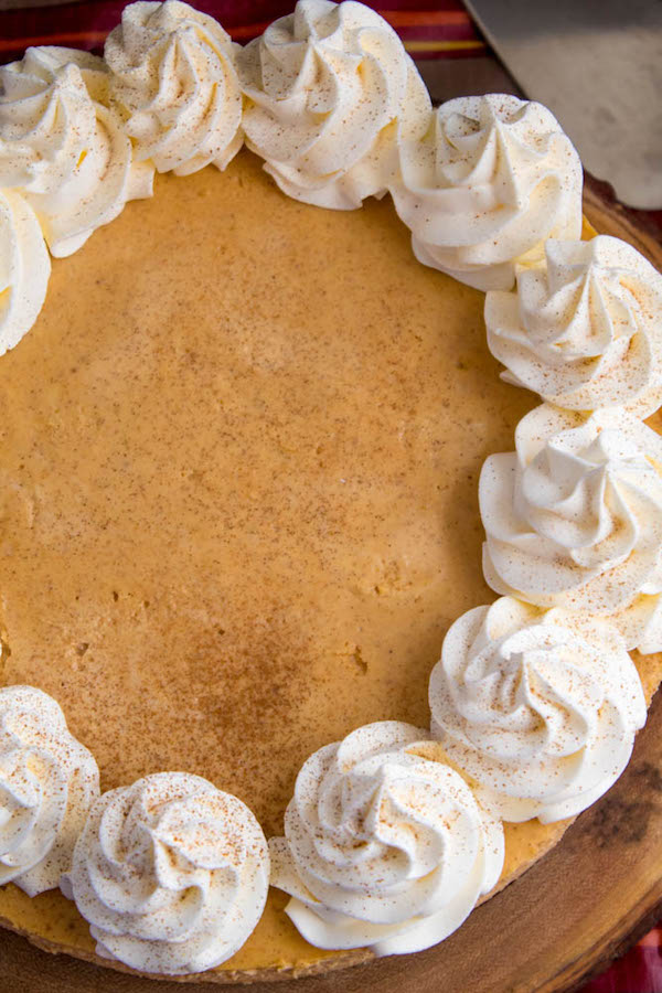 Rich and creamy pumpkin cheesecake paired with a spiced gingersnap crust! This is the perfect dessert to enjoy after your Thanksgiving dinner. 