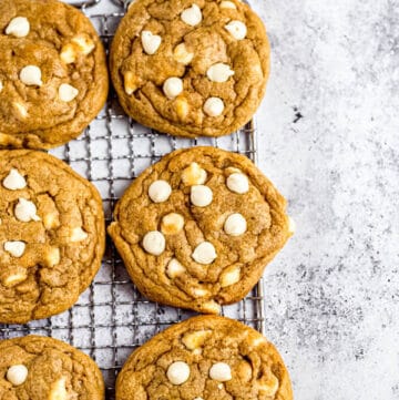 white chocolate chip pumpkin cookies on a safety grater