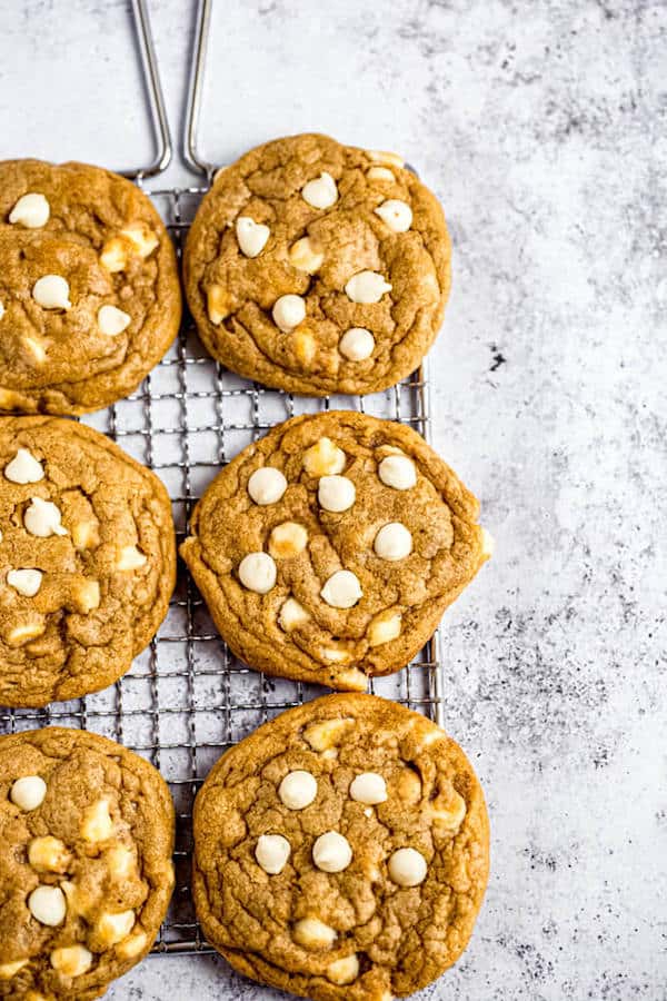 white chocolate chip pumpkin cookies on a safety grater