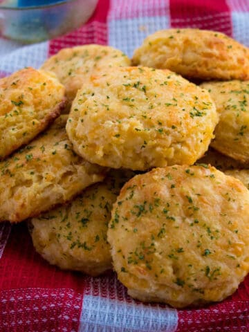 These Homemade Cheddar Biscuits are extremely tender, fluffy, buttery and savory. This is the perfect side dish to add to your Holiday dinner menu.