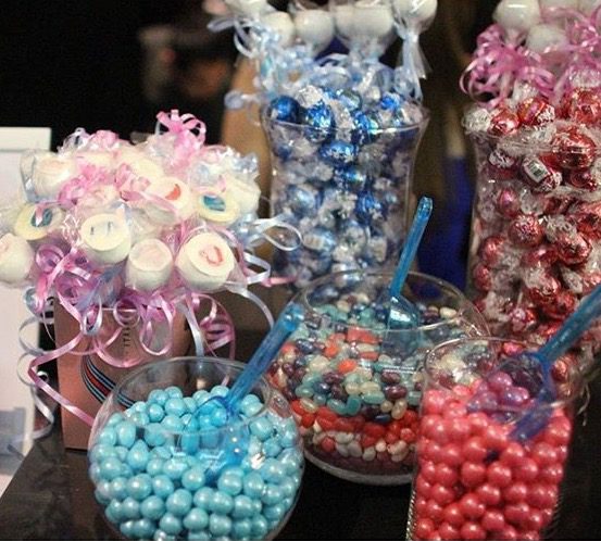 These Gender Reveal Cake Pops are a fun and cute way to surprise your baby shower guests! Once they bite into it, the pink or blue cake inside will reveal if it's a boy or girl!
