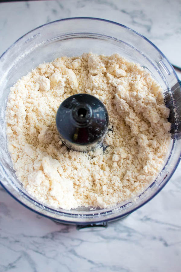 adding cold butter and shortening to perfect pie crust with food processor