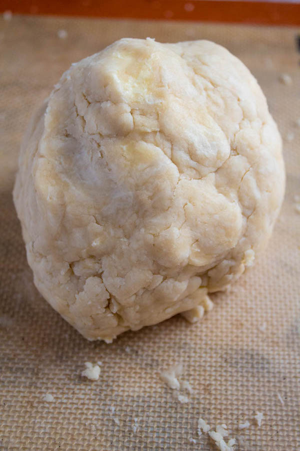 shaping pie dough into a ball