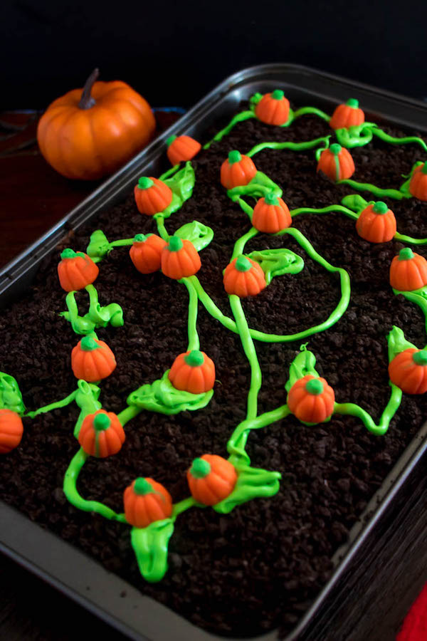 This Pumpkin Patch Poke Cake is super fun, easy and festive! This cute dessert would be a great treat to serve after Thanksgiving dinner!