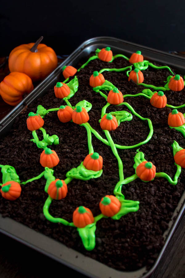 This Pumpkin Patch Poke Cake is super fun, easy and festive! This cute dessert would be a great treat to serve after Thanksgiving dinner!