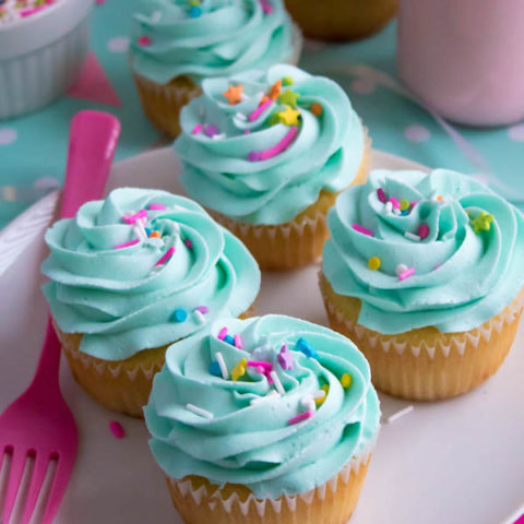 These Vanilla Cupcakes are light, fluffy and incredibly moist! Topped with a creamy and Dreamy Vanilla Buttercream, these are the best cupcakes for a birthday party or any event!