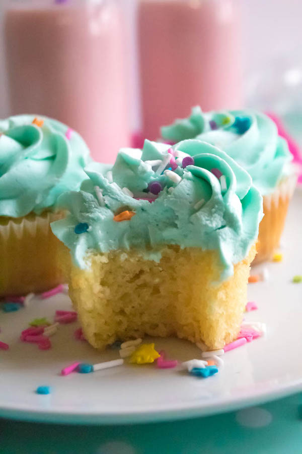 These Vanilla Cupcakes are light, fluffy and incredibly moist! Topped with a creamy and Dreamy Vanilla Buttercream, these are the best cupcakes for a birthday party or any event!