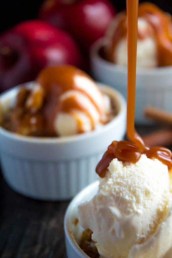 Salted Caramel Apple Crisp – Fresh apples, tossed with sugar and spices, blanketed under a layer of salted caramel sauce and topped with a crispy oatmeal-pecan crumble! This salty and sweet treat is the perfect dessert for Fall and Thanksgiving!