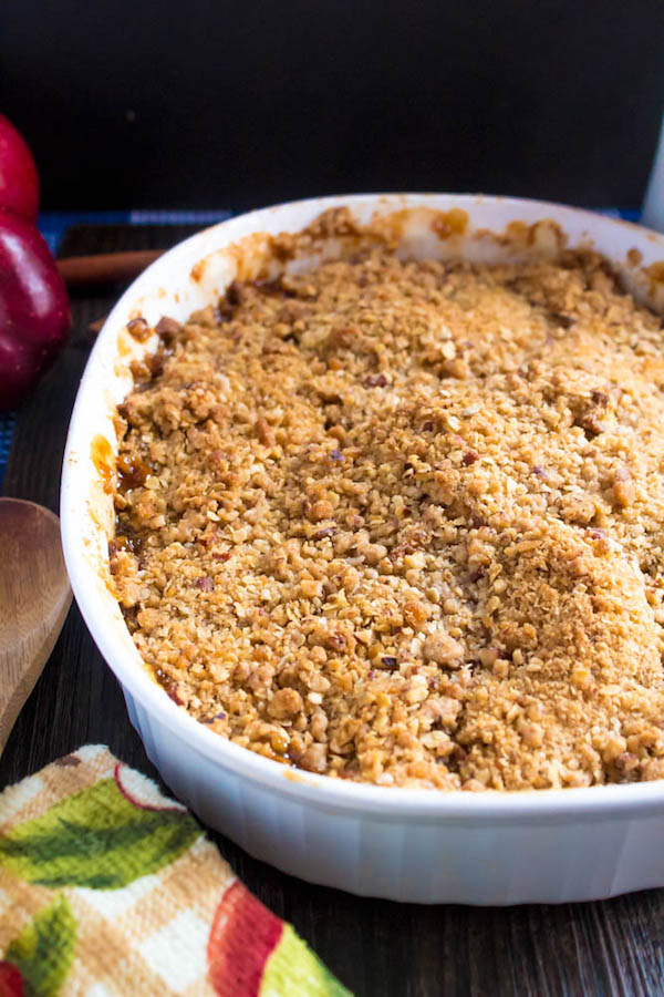 Salted Caramel Apple Crisp – Fresh apples, tossed with sugar and spices, blanketed under a layer of salted caramel sauce and topped with a crispy oatmeal-pecan crumble! This salty and sweet treat is the perfect dessert for Fall and Thanksgiving!