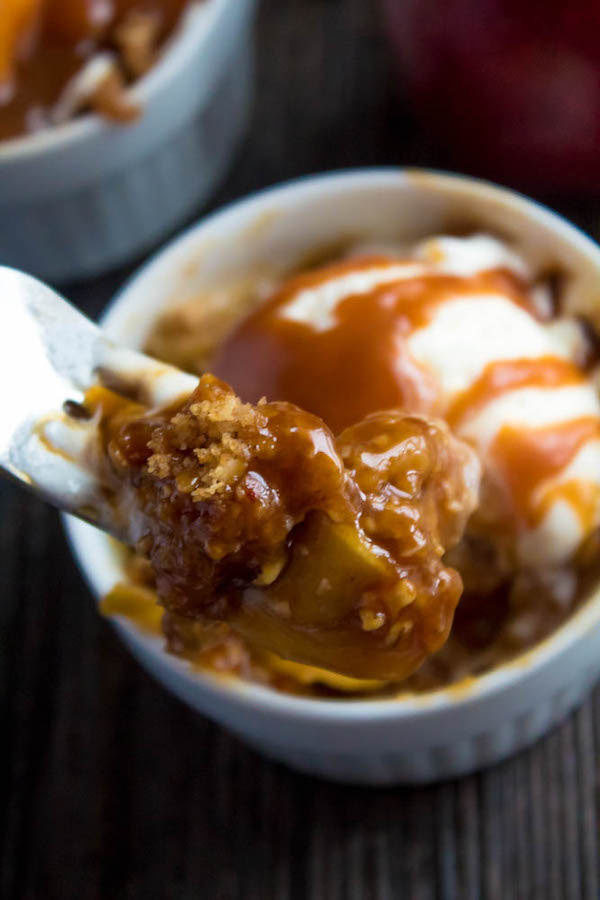 Salted Caramel Apple Crisp – Fresh apples, tossed with sugar and spices, blanketed under a layer of salted caramel sauce and topped with a crispy oatmeal-pecan crumble! This salty and sweet treat is the perfect dessert for Fall and Thanksgiving!