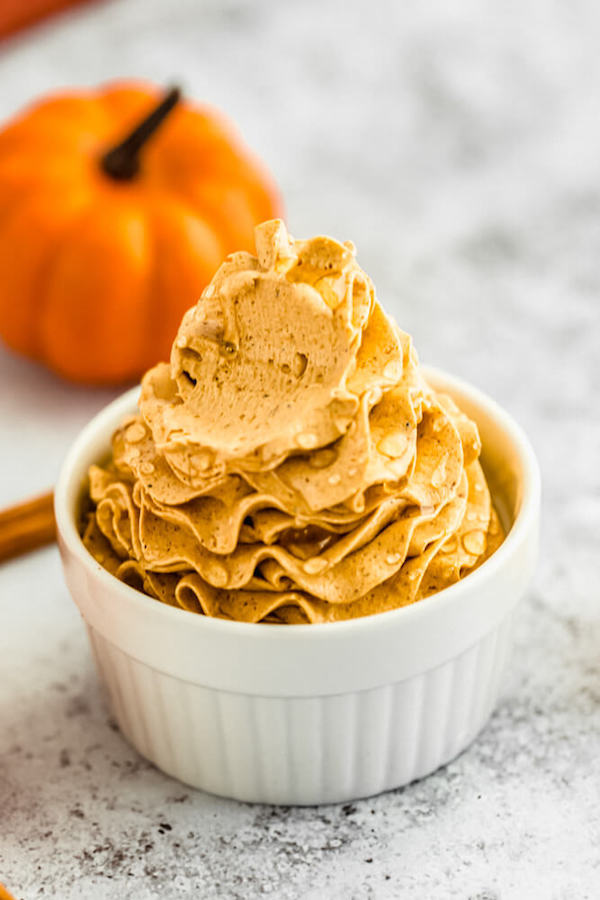 swirl of whipped pumpkin spice honey butter in a ramekin