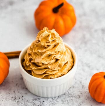 swirl of whipped pumpkin spice honey butter in a ramekin