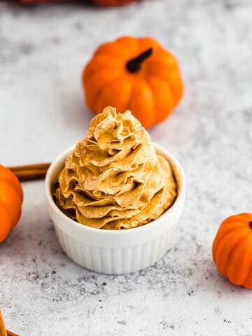 swirl of whipped pumpkin spice honey butter in a ramekin