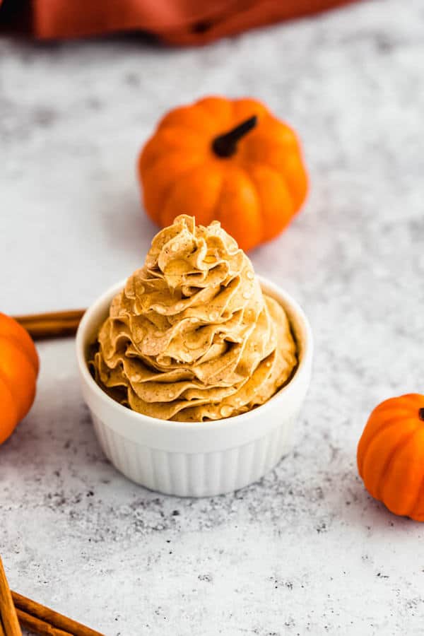 swirl of whipped pumpkin spice honey butter in a ramekin