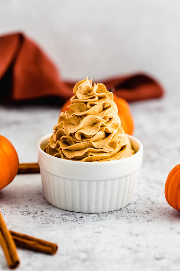 swirl of whipped pumpkin spice honey butter in a ramekin