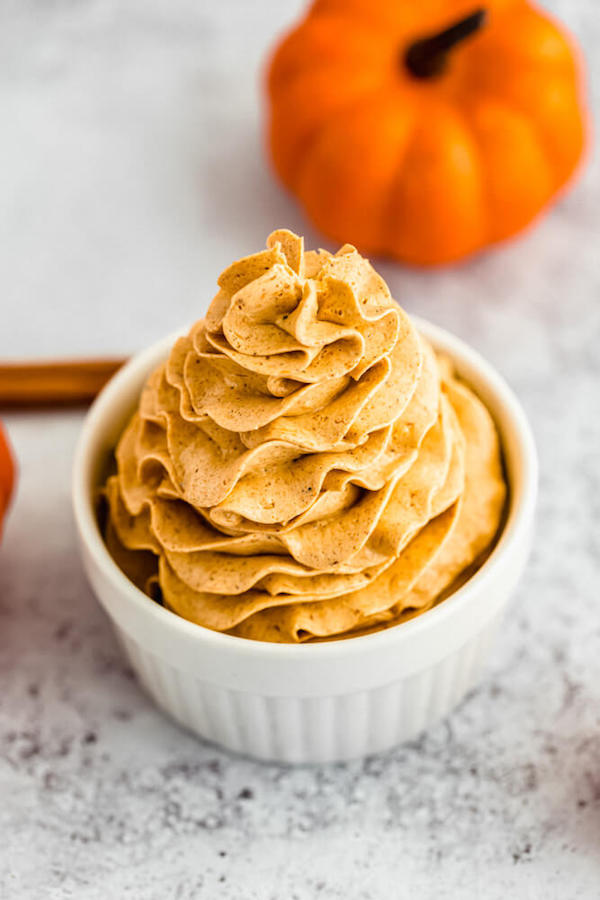 swirl of whipped pumpkin spice honey butter in a ramekin