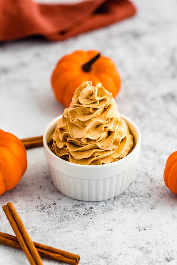 swirl of whipped pumpkin spice honey butter in a ramekin