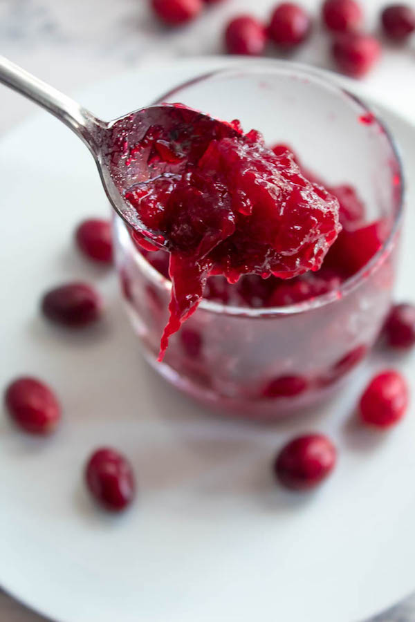 This Whipped Cranberry Honey Butter is sweet, tart, fruity and simple to make. It's perfect on toast, raisin bread, scones, dinner rolls, bagels and so much more!