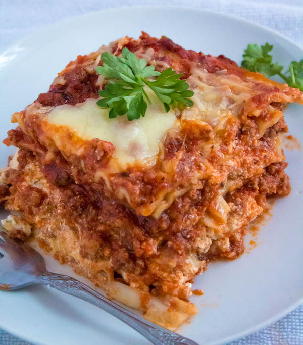 This Lasagna is the best I've ever had! Layers of a thick and meaty sauce, creamy ricotta filling and a cheesy topping. I guarantee this will be your new favourite go-to recipe for the holidays!