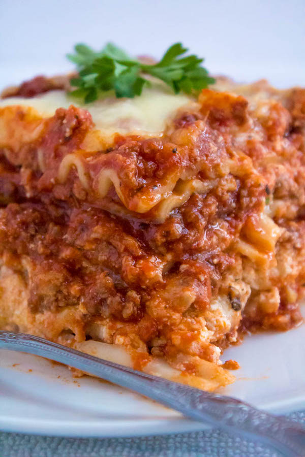 This Lasagna is the best I've ever had! Layers of a thick and meaty sauce, creamy ricotta filling and a cheesy topping. I guarantee this will be your new favourite go-to recipe for the holidays!