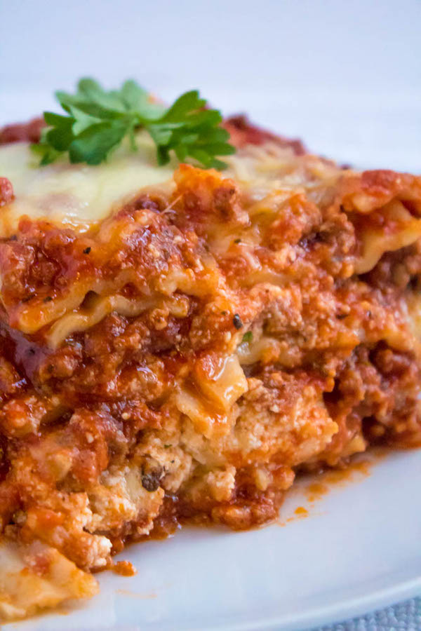 This Lasagna is the best I've ever had! Layers of a thick and meaty sauce, creamy ricotta filling and a cheesy topping. I guarantee this will be your new favourite go-to recipe for the holidays!