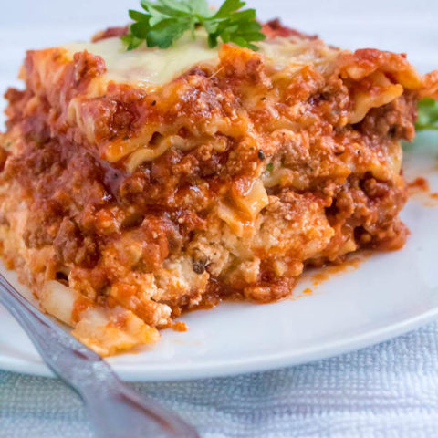 This Lasagna is the best I've ever had! Layers of a thick and meaty sauce, creamy ricotta filling and a cheesy topping. I guarantee this will be your new favourite go-to recipe for the holidays!