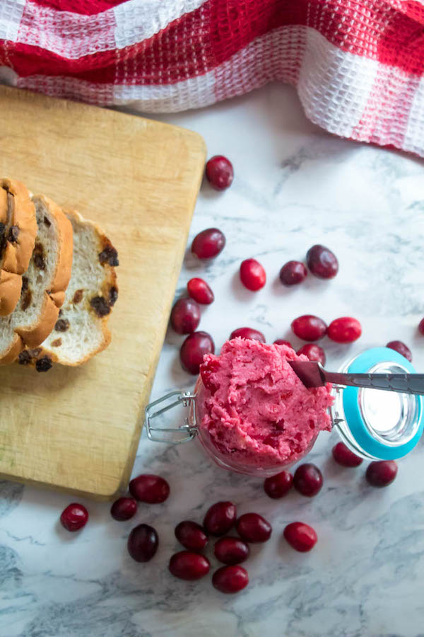 This Whipped Cranberry Honey Butter is sweet, tart, fruity and simple to make. It's perfect on toast, raisin bread, scones, dinner rolls, bagels and so much more!