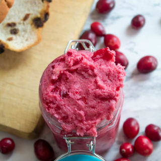 This Whipped Cranberry Honey Butter is sweet, tart, fruity and simple to make. It's perfect on toast, raisin bread, scones, dinner rolls, bagels and so much more!