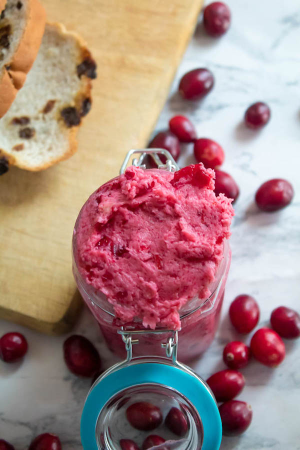 This Whipped Cranberry Honey Butter is sweet, tart, fruity and simple to make. It's perfect on toast, raisin bread, scones, dinner rolls, bagels and so much more!