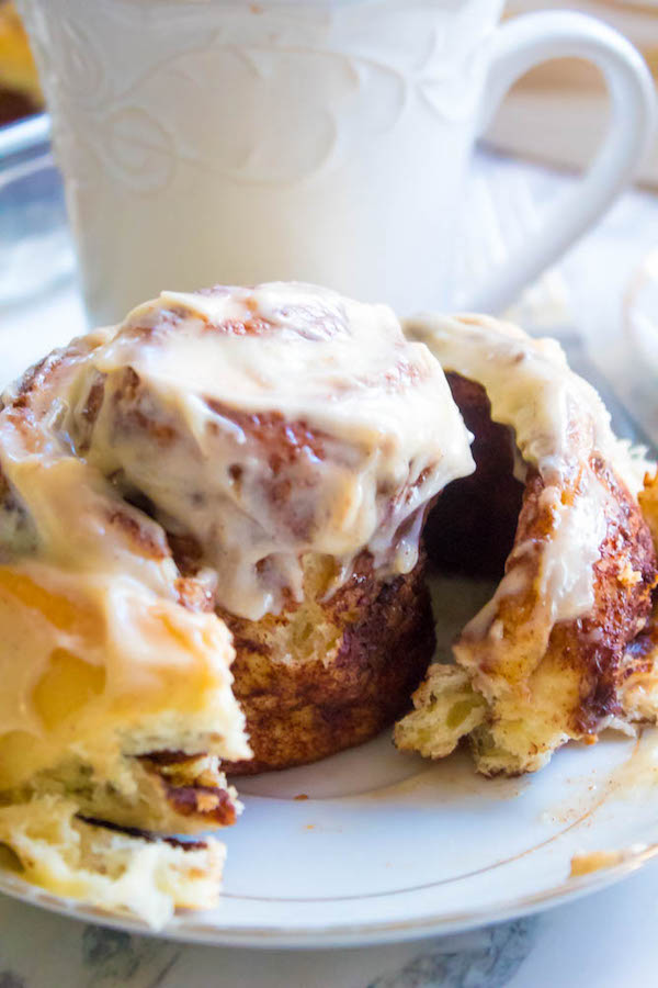 These are hands down the best Cinnamon Rolls I've ever had! They're incredibly soft, fluffy, warm and gooey. Smothered in a silky smooth Cinnamon Cream Cheese Icing, this will undoubtedly be your new favourite cinnamon roll recipe!